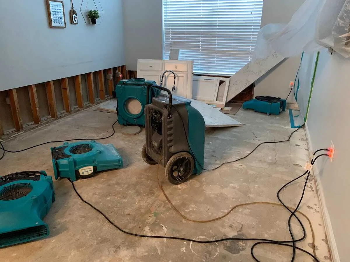 Dehumidifier in flood-cut room for Water Damage Restoration in New Square